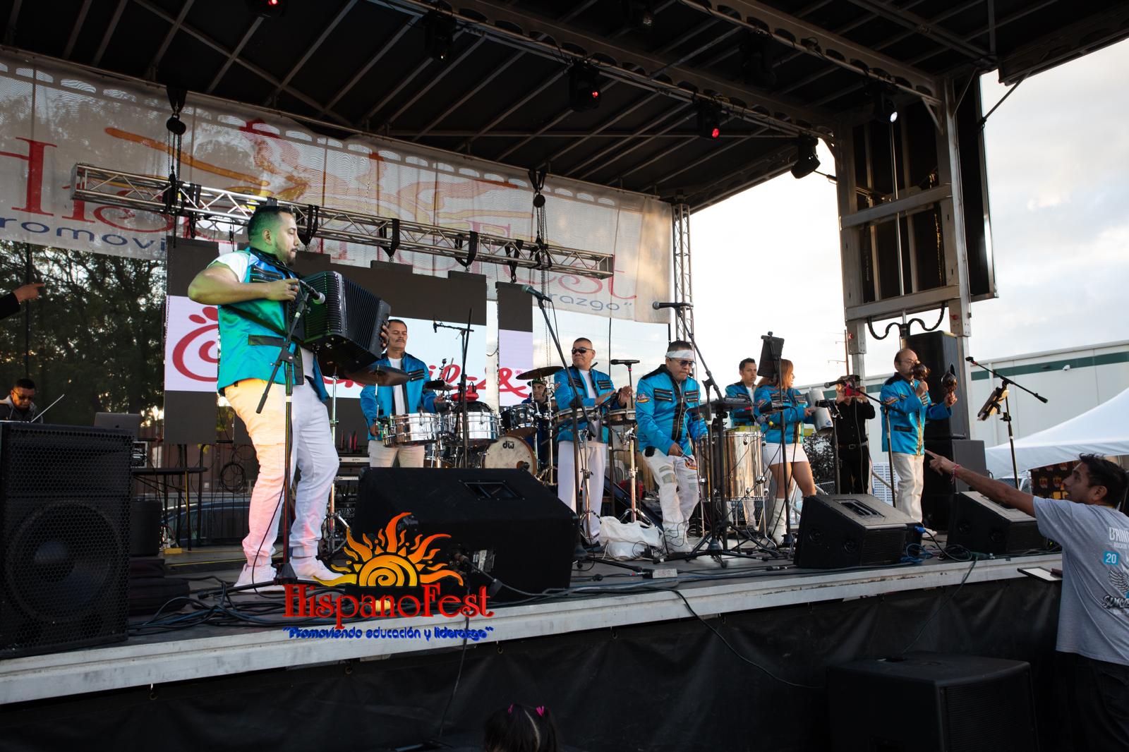 Full band lighting up the main stage